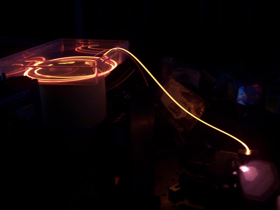Laser in optic fibre