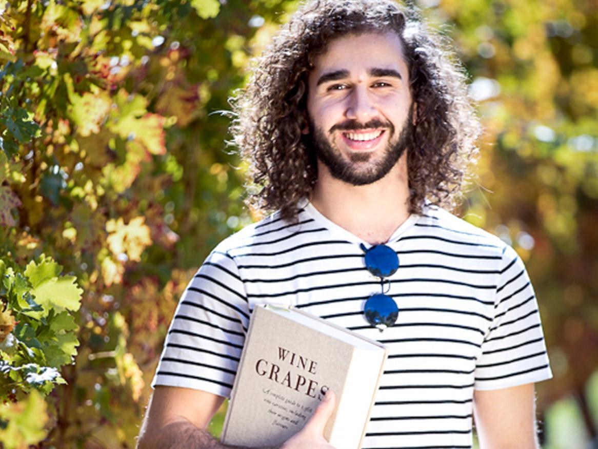 Wine science student standing at Waite campus