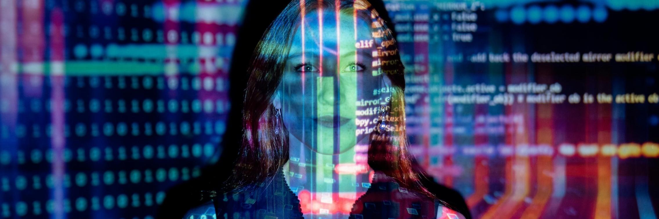 Woman with coding projected over the top. 