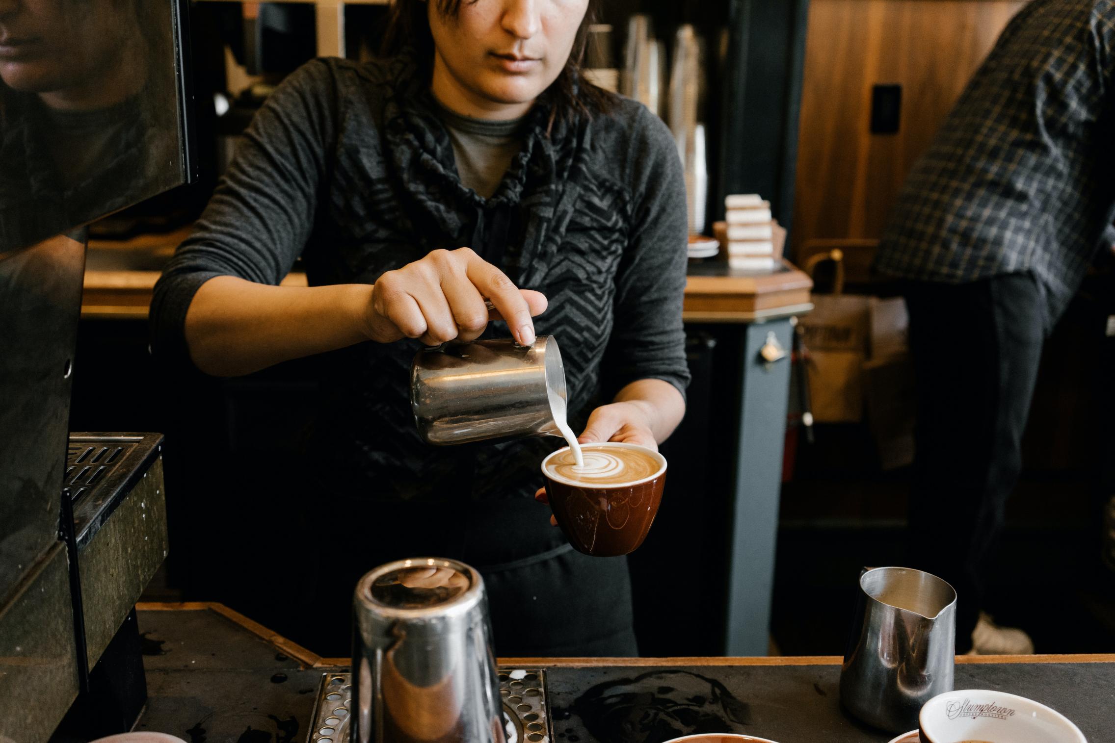 person serving coffee