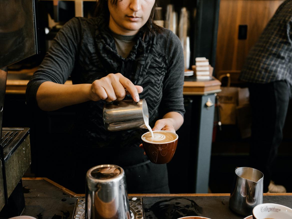 person serving coffee