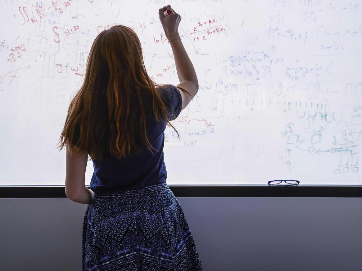 Teacher at whiteboard