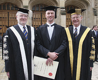 Former Adelaide Crows footballer Nigel Smart with Vice-Chancellor and President Professor James McWha and Chancellor the Hon. John von Doussa QC