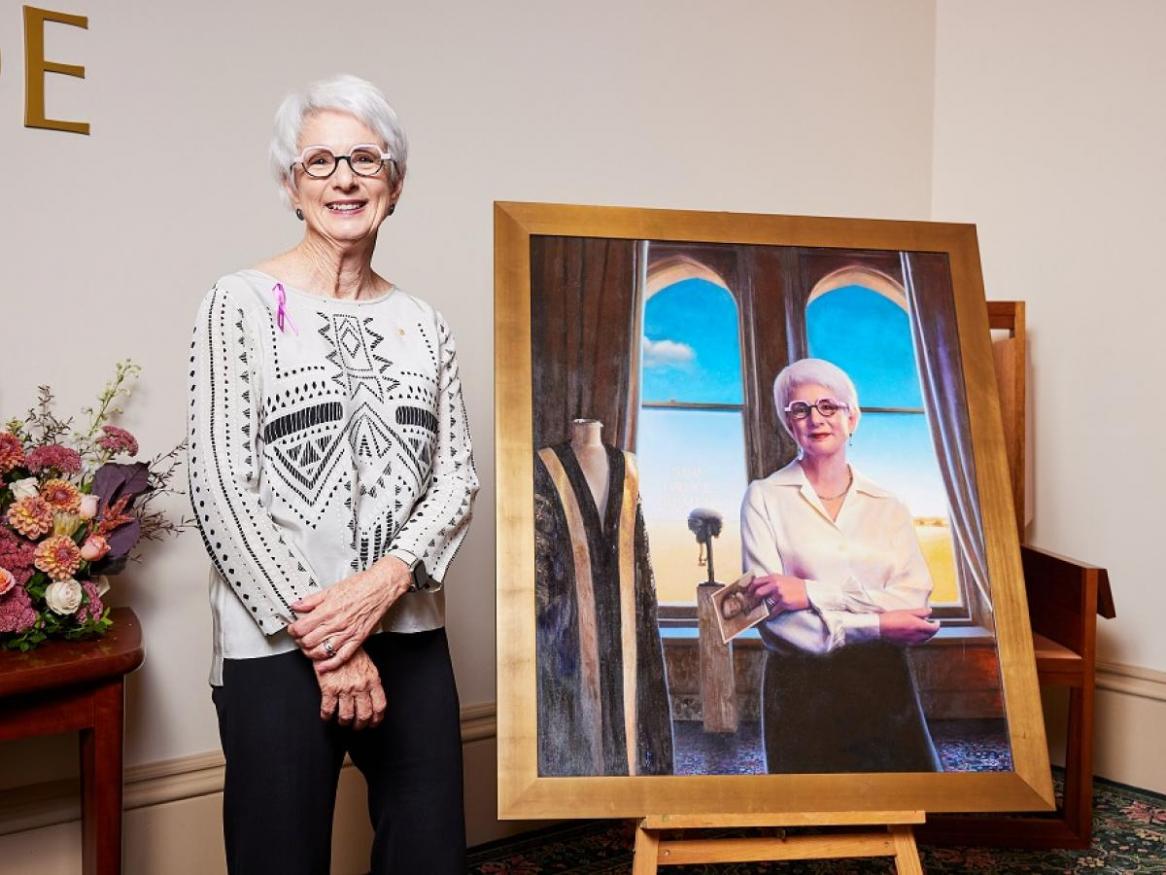 The Honourable Catherine Branson AC KC, Chancellor, University of Adelaide with her portrait.