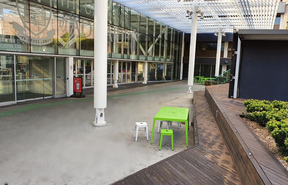 Outdoor concreted space at the entrance to Hub Central