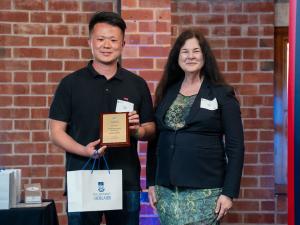 Outstanding Graduate Achievement Award — Baitao Chang with Deputy Vice Chancellor & Vice President (Academic), Professor Jennie Shaw