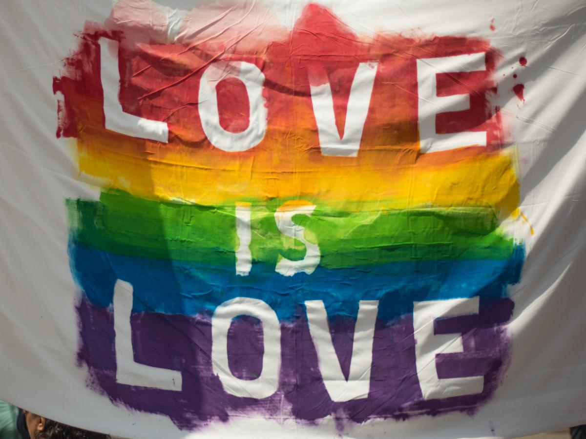 image of flag that reads love is love