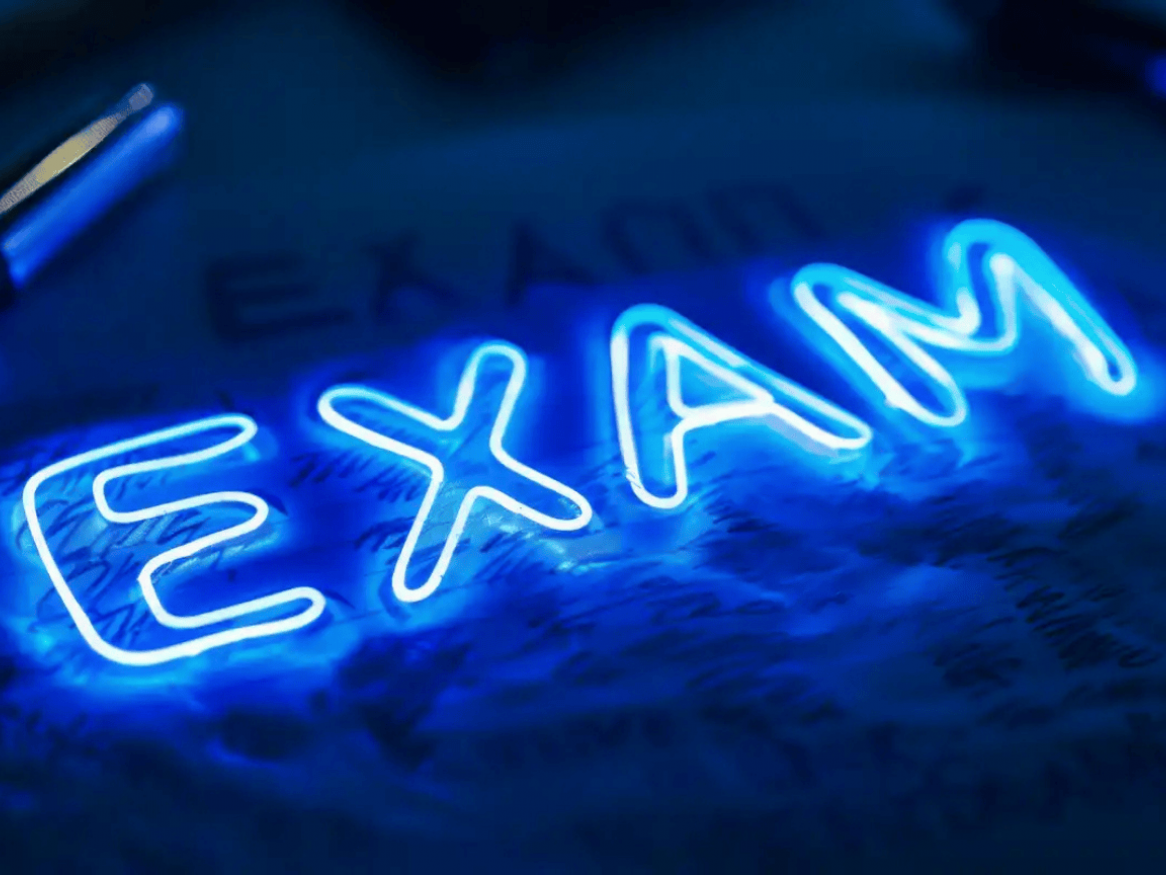 Exam in neon lettering