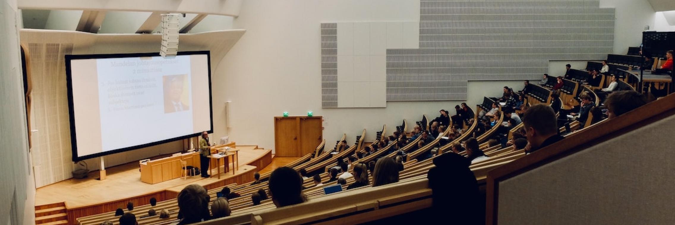 Students in a lecture hall.