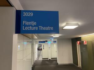 Photo of door to Flentje lecture theatre, Level 3 near entrance to Library