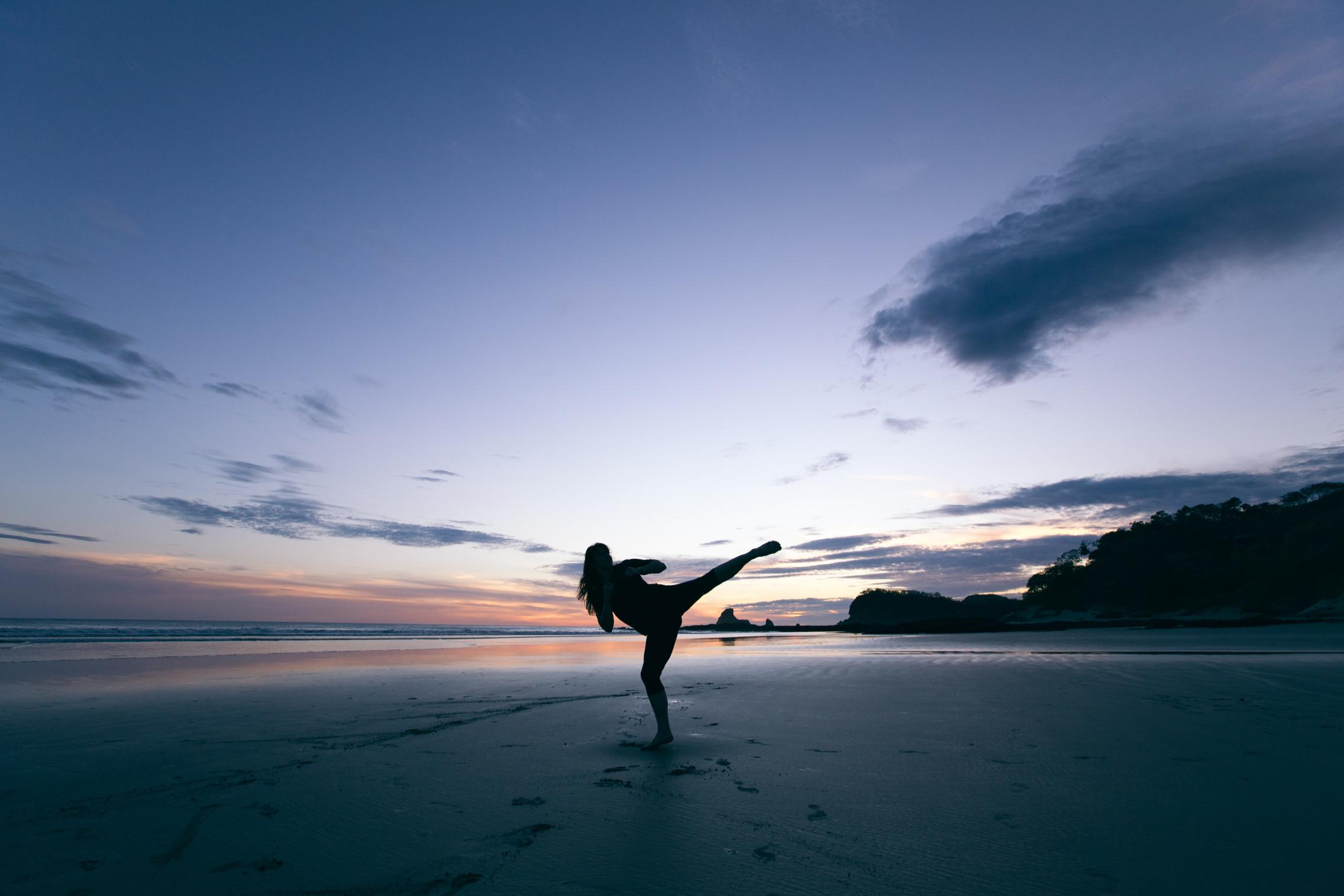 Martial artist on beach