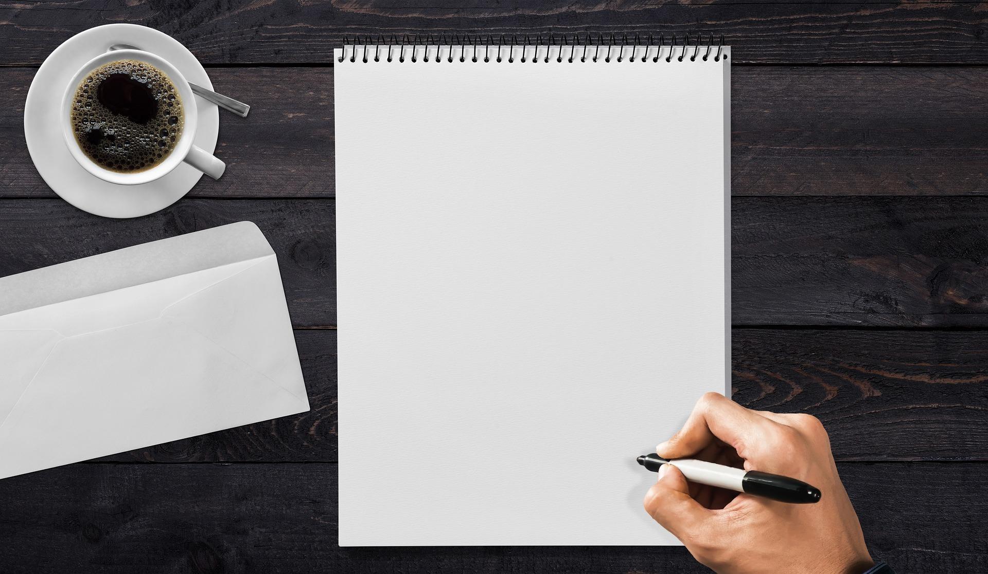 A writing pad and pen