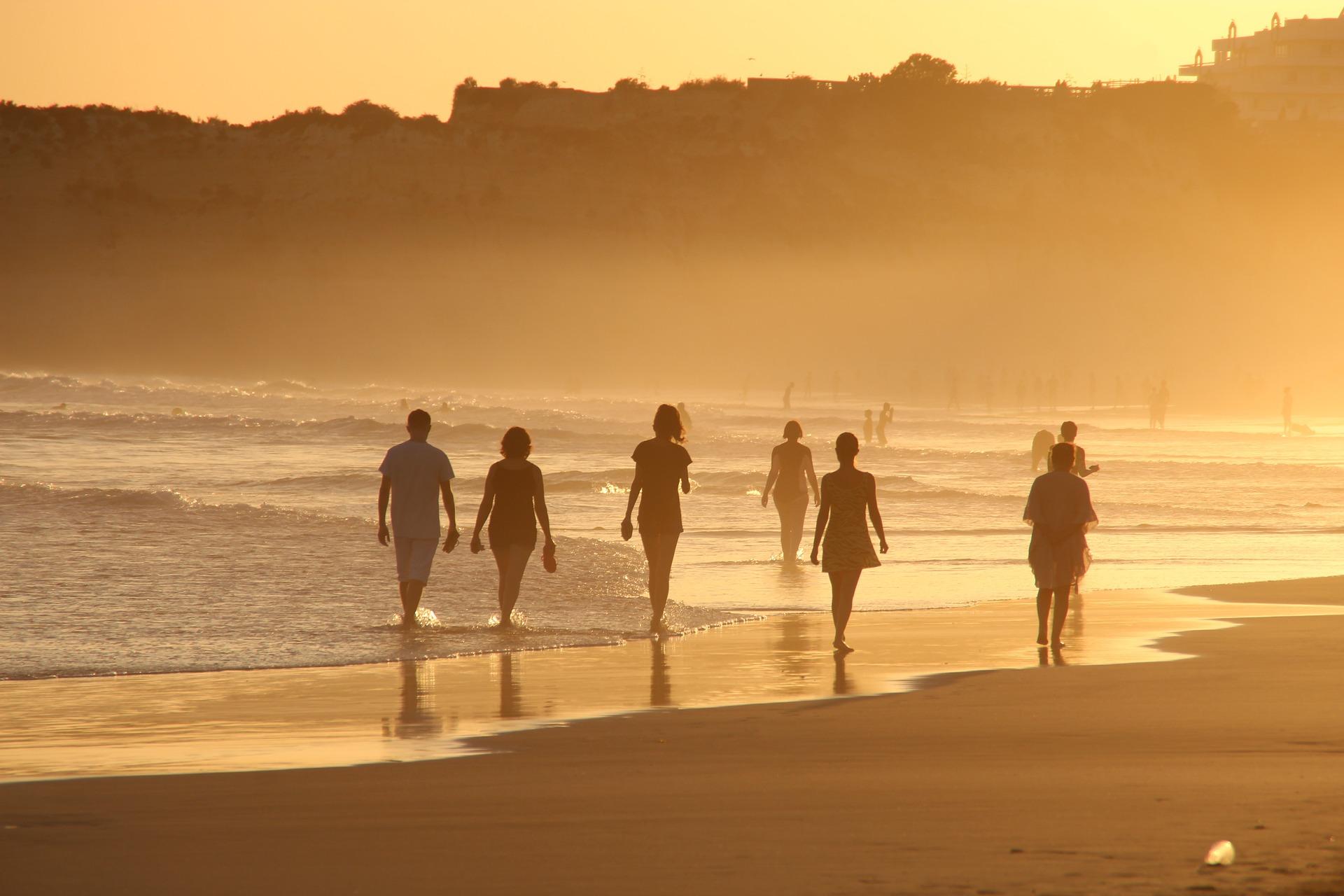 friends walking on the beack
