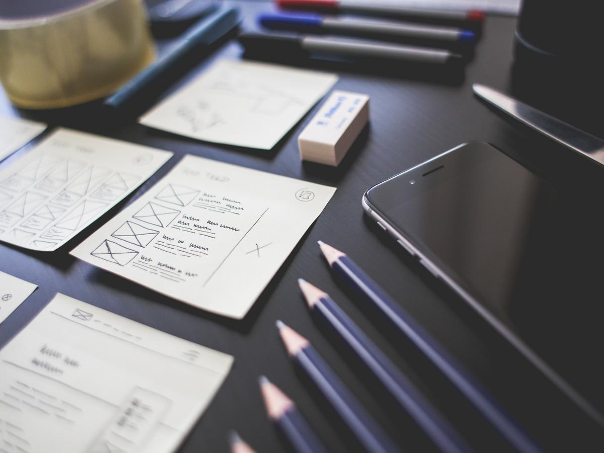 Pencils and Todolists on desk.