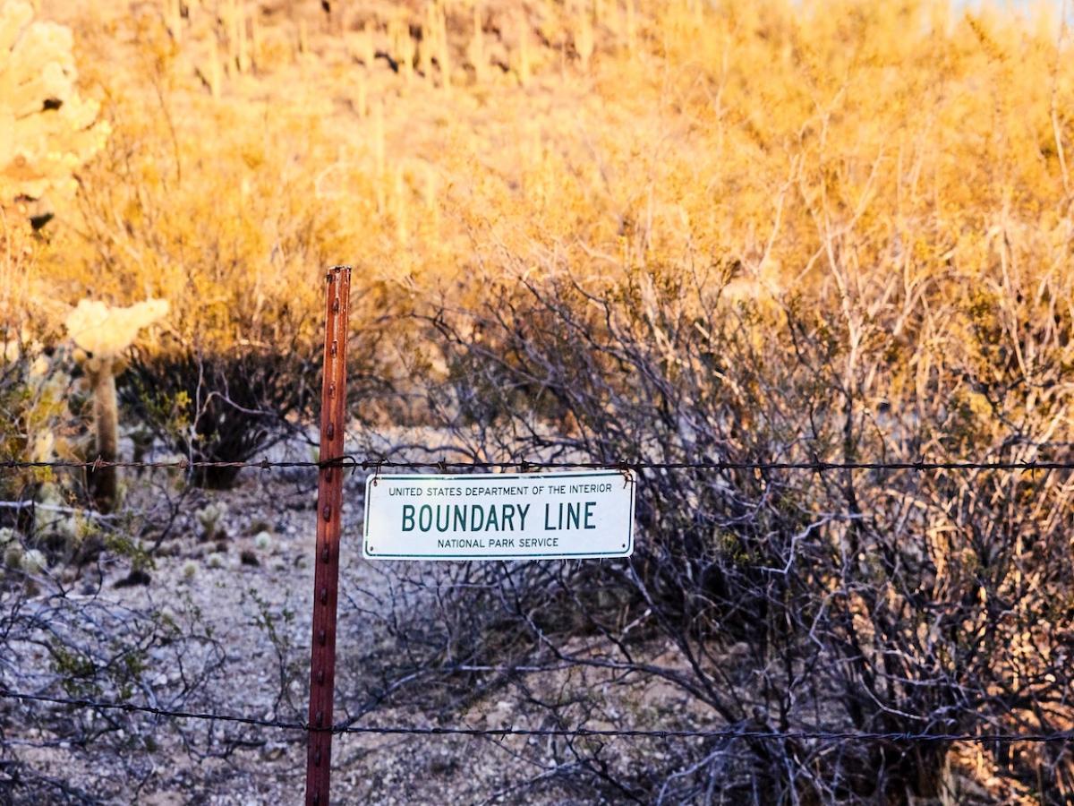 A sign saying "Boundary Line"