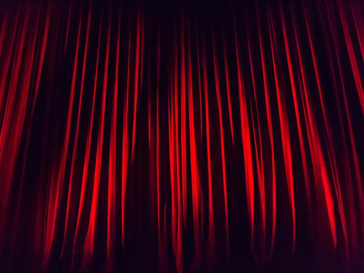 A red stage curtain.