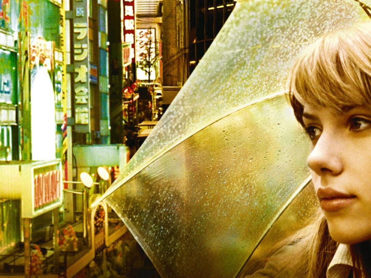 Scarlett Johanssen's face with background image of Tokyo