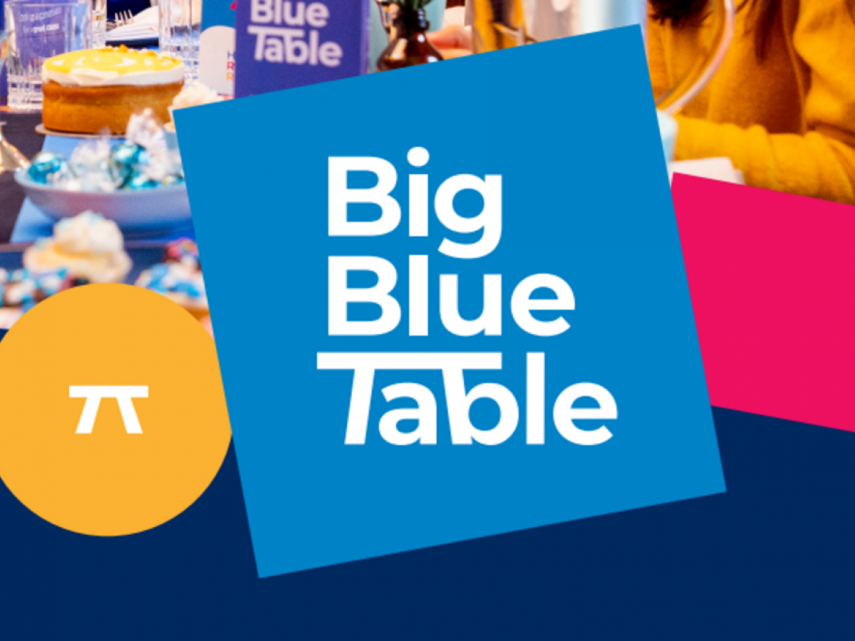 Text: Big blue table, Beyond Blue with photo of table and food in background