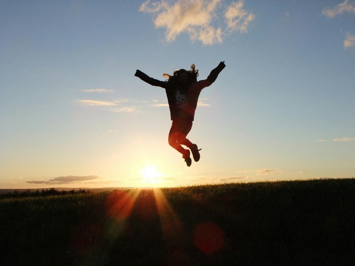 jumping in front of sunset