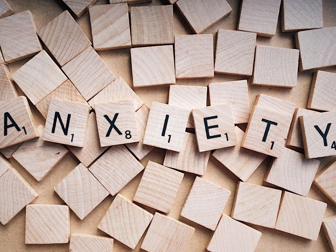 Anxiety spelt on woodblocks 