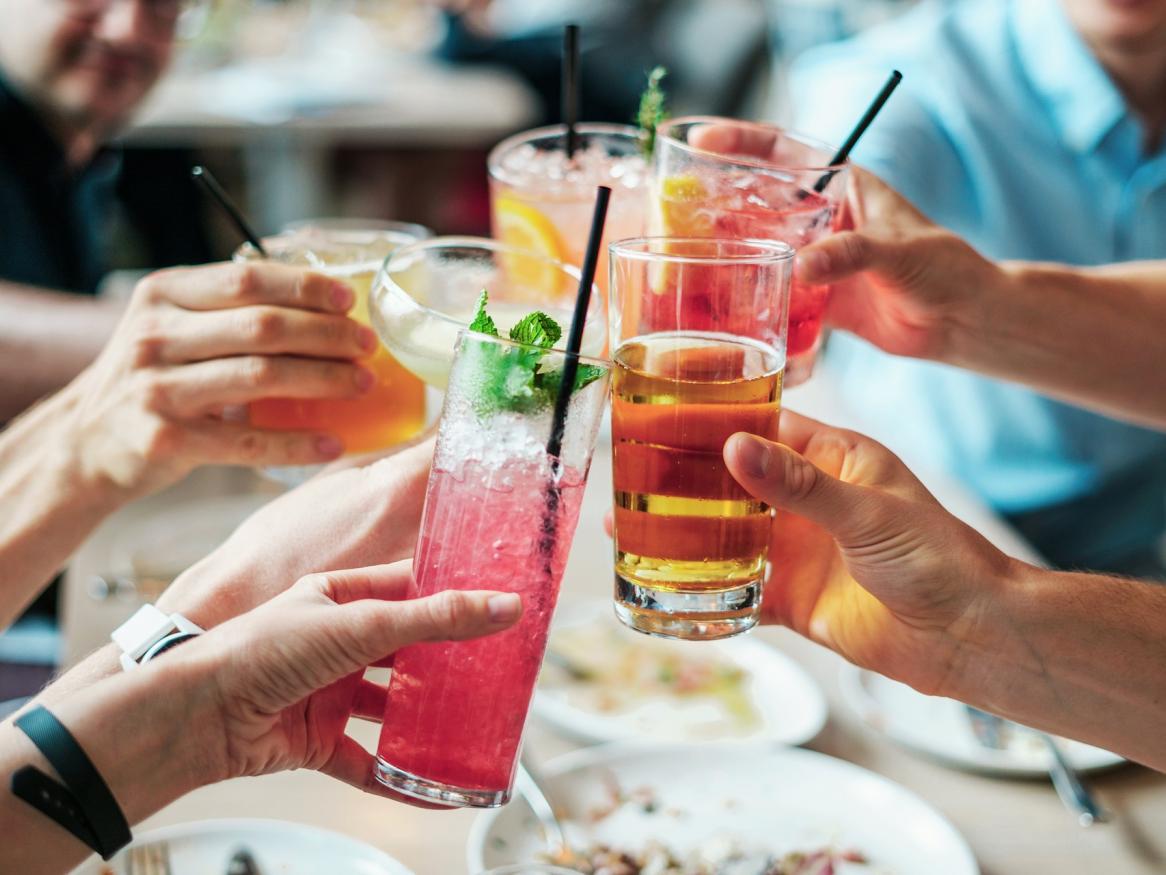 A group clink drinks