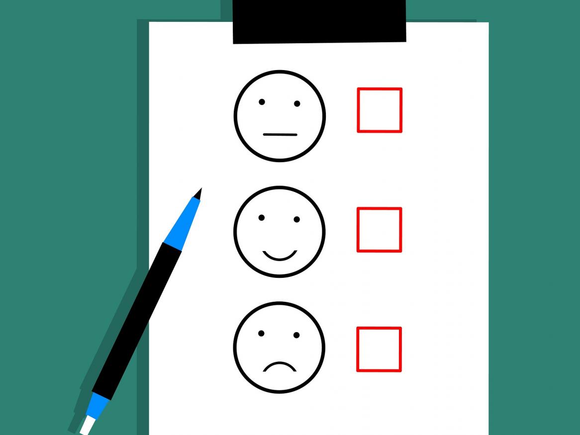 tick box with 3 different emotions (happy, neutral, sad)