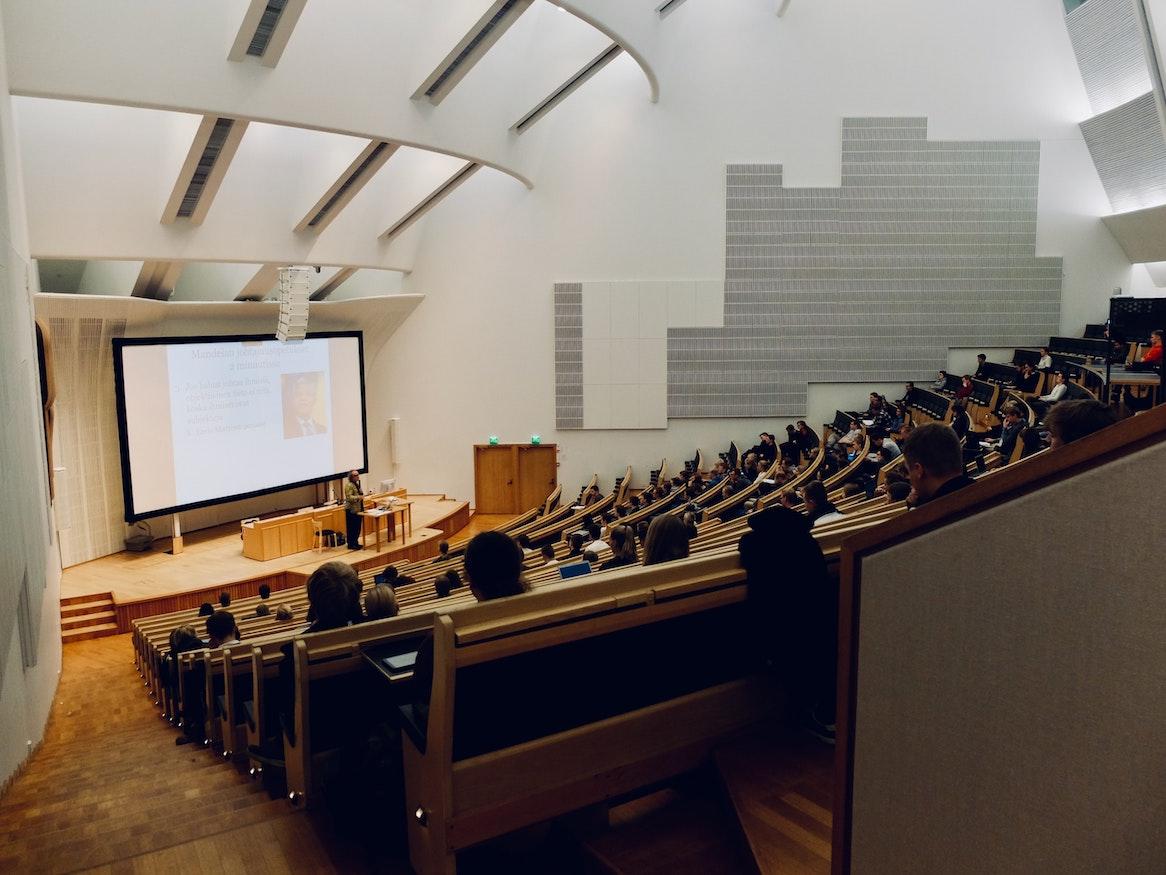 A lecture hall filled with students.