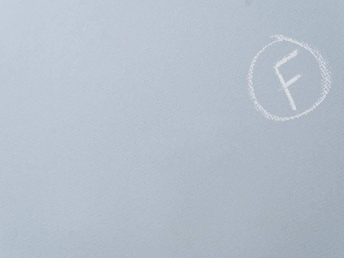 grey background with an F grade drawn in white chalk
