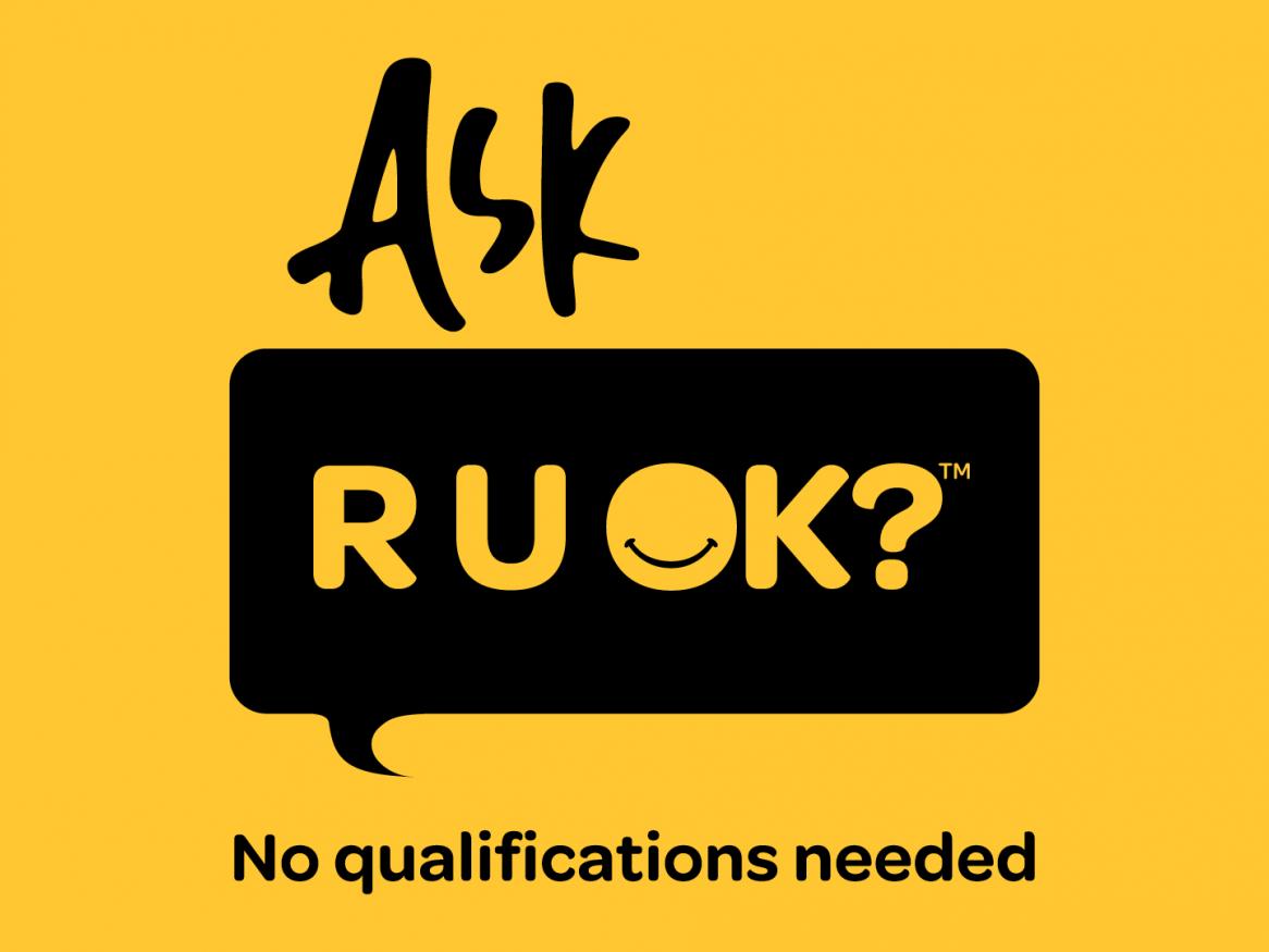 Ask RUOK? No qualifications needed. Black writing on yellow background