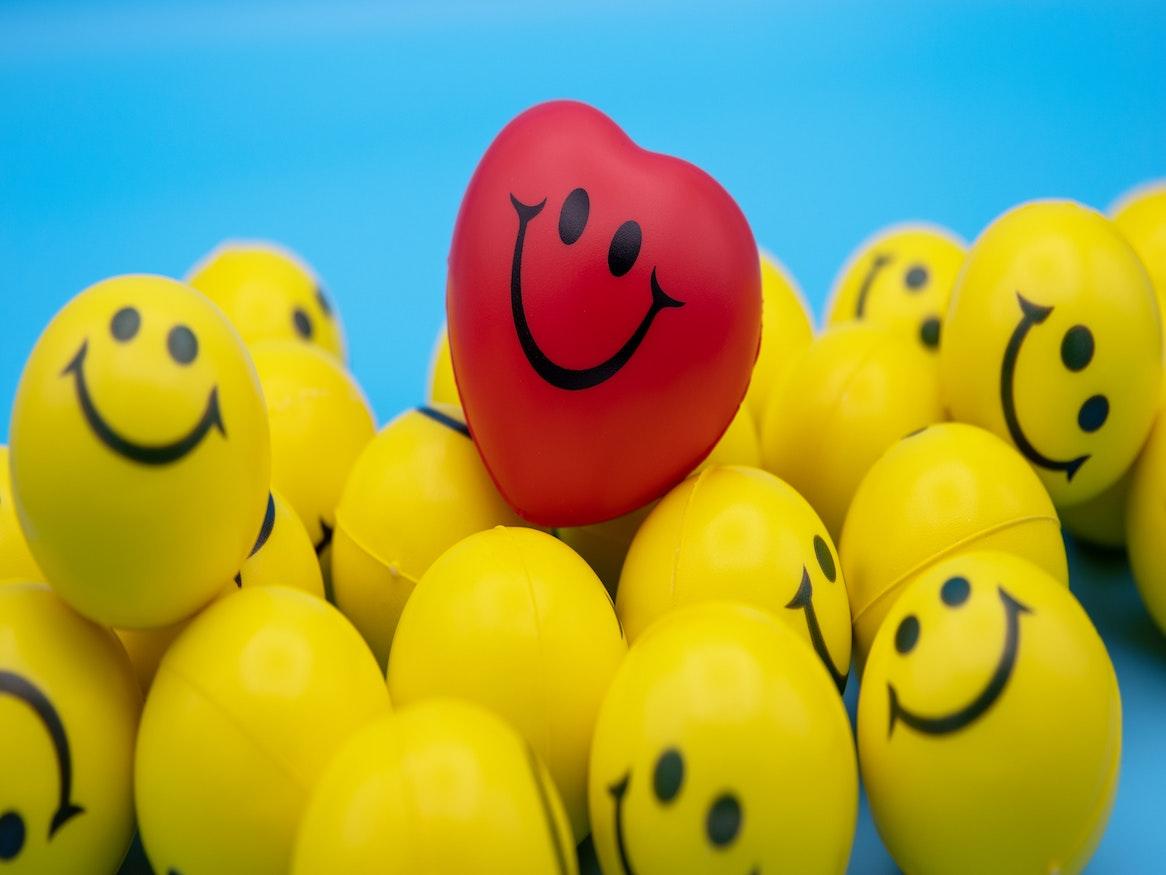 A pile of smiley stress balls 