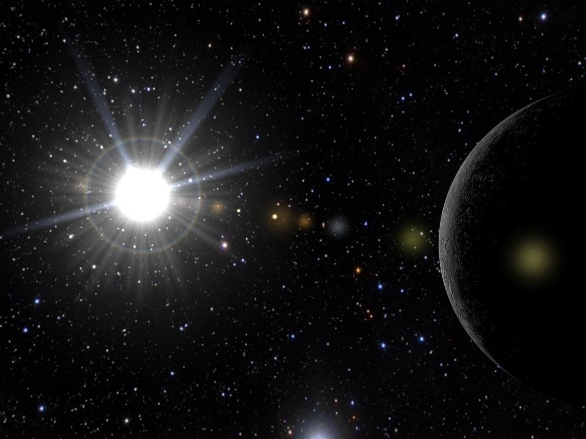 The sun in the solar system, illuminating nearby planets.