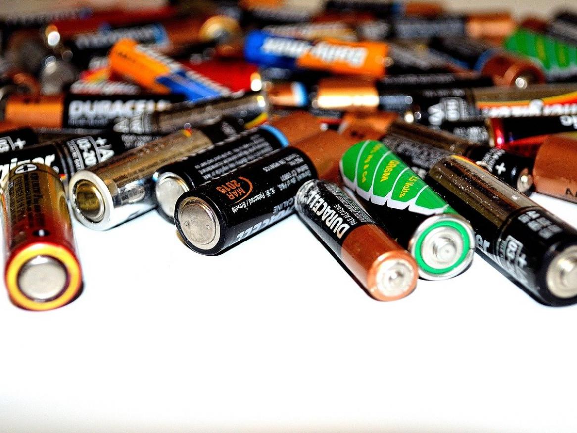 A pile of coloured batteries.