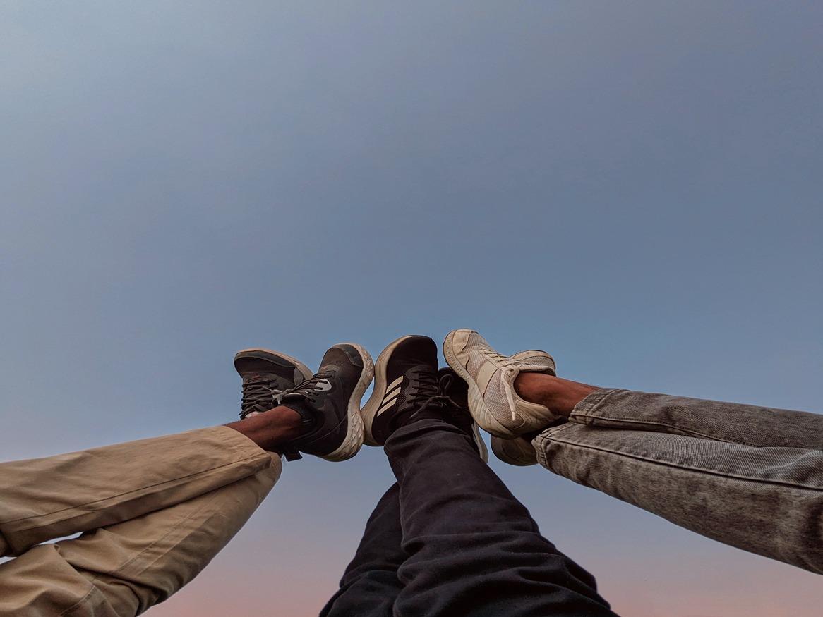 people crossing their legs