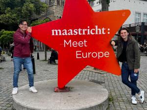 Bryan with a friend next to star statue in Maastricht (2024)
