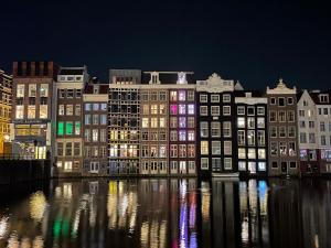 Houses by the canal at night - Amsterdam, taken by Bryan Lau (2024)