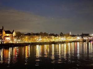 Maastricht at night by the Maas river, taken by Bryan Lau (2024)