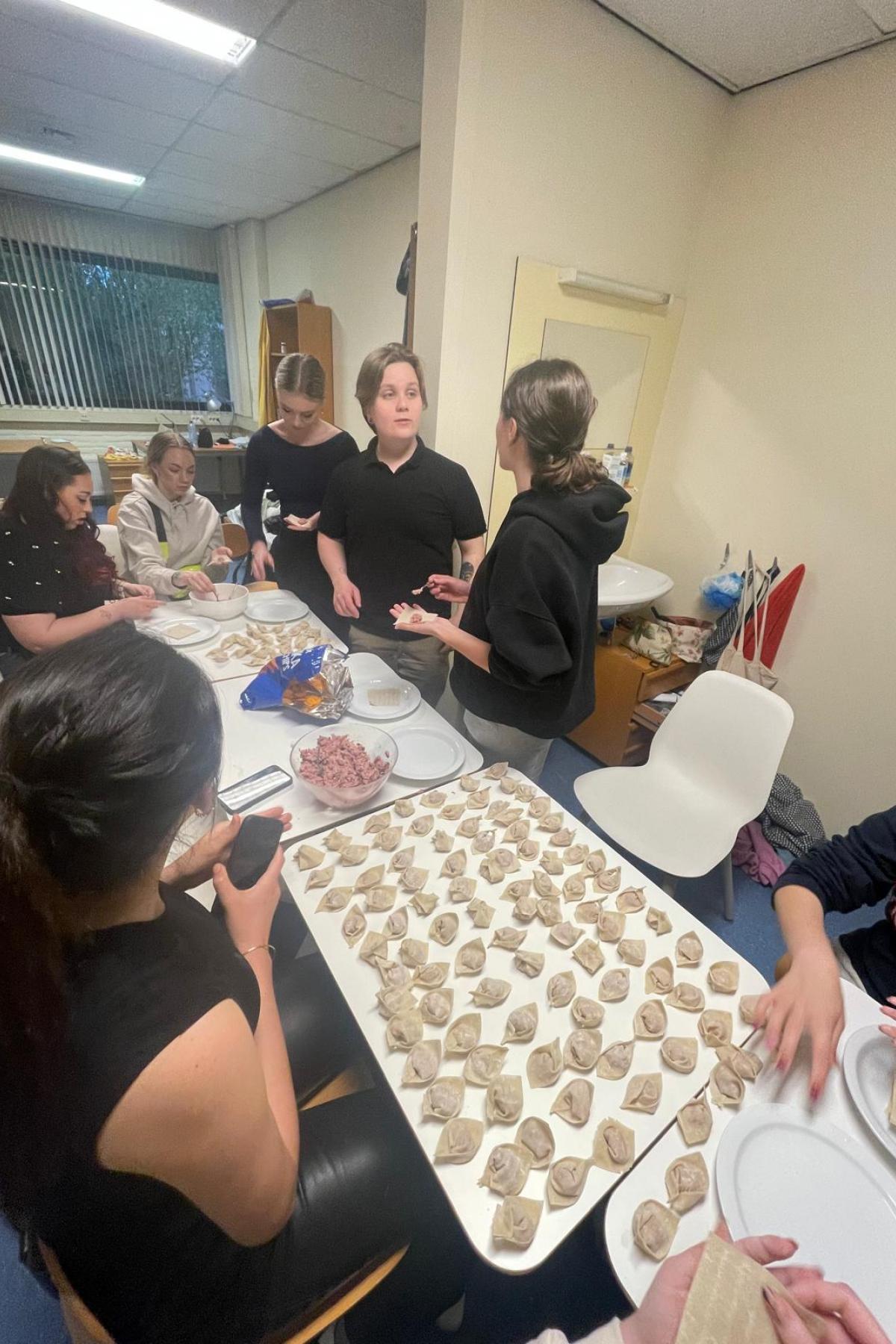 Bryan teaching his exchange friends how to make dumplings, taken by Bryan Lau (2024)