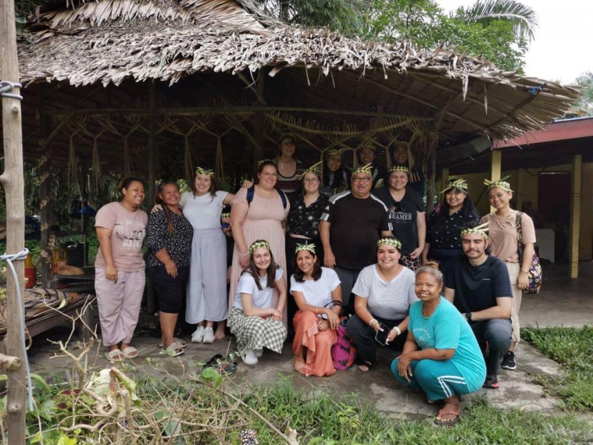 Group of students in Indigenous village in Malaysia 