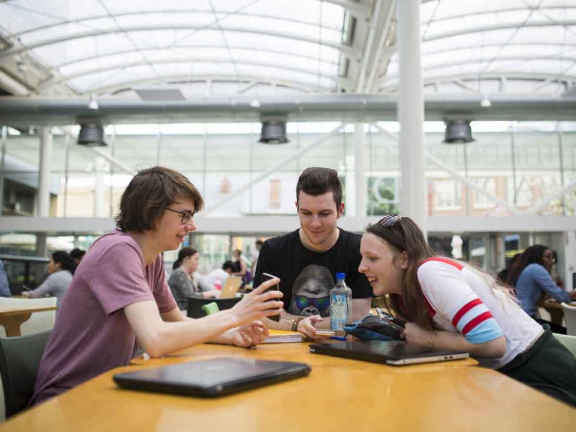 Students socialising in the Hub on campus