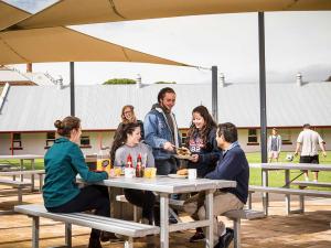 Roseworthy Residential College students enjoy communal BBQs under the sails.