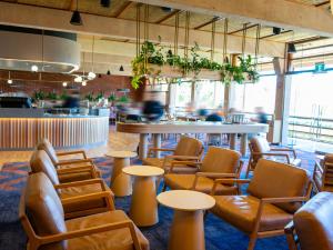Taikunthi restaurant with couch seating and bar
