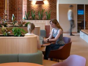Students sitting in the Union House student lounge