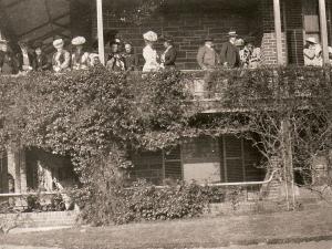 Ladies and gentlemen on the balcony of Urrbrae House c. early 1900s. From Urrbrae House historic photographic collection.