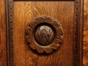 Sideboard door with Peter Waite's initials in the Dining Room