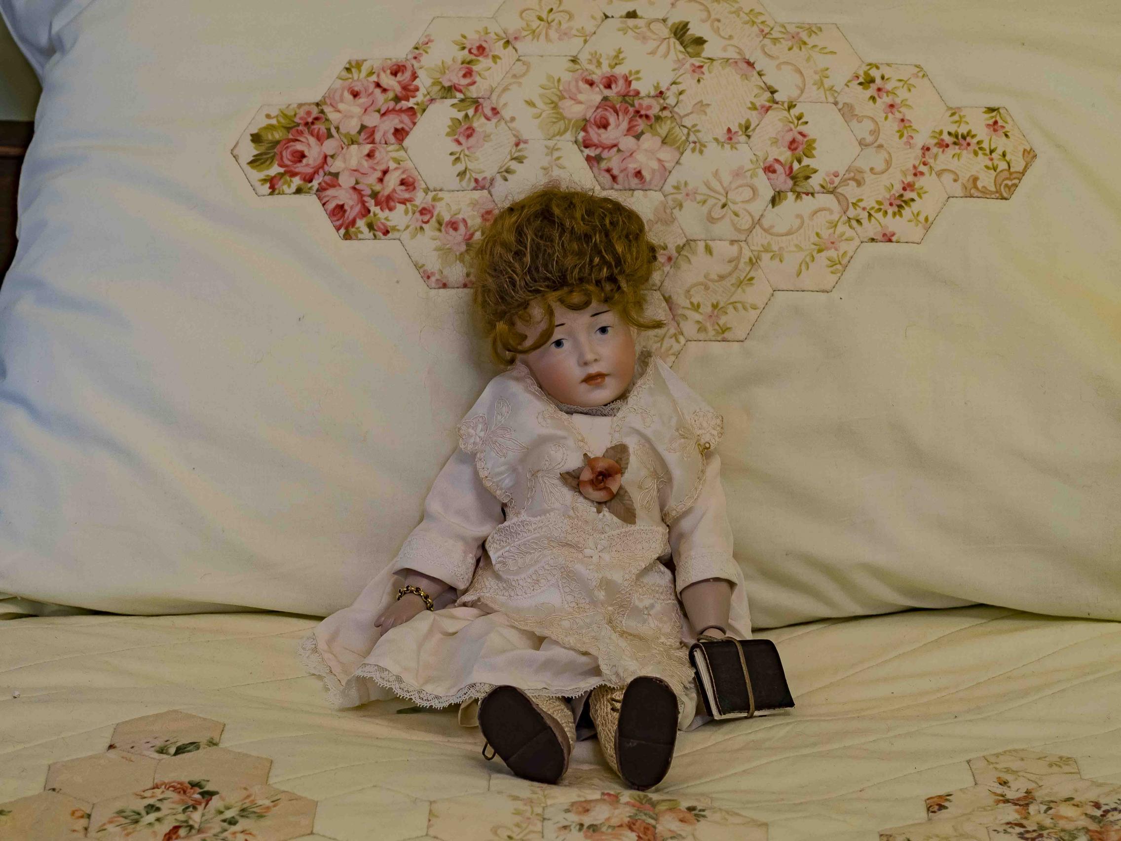 Hand-made reproduction porcelain doll