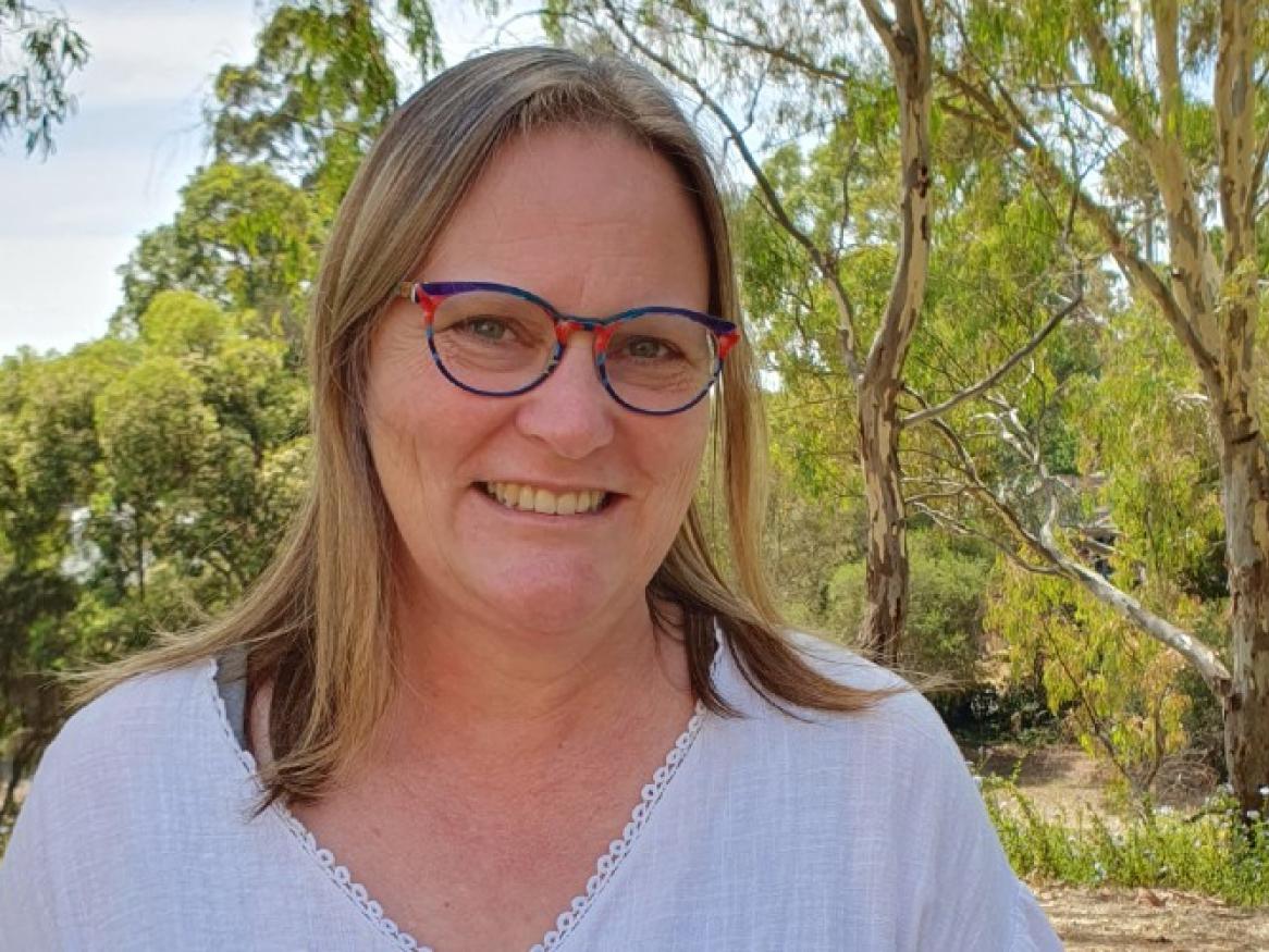 Helen Collins in green environment